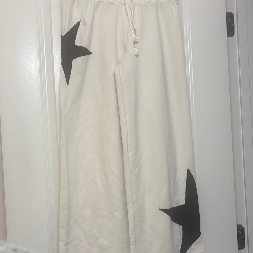 SHEIN Cream Track Pants with Black Star Accents